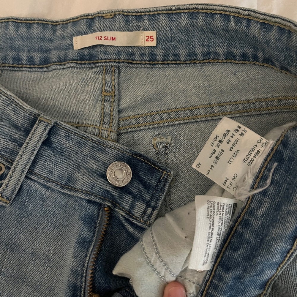 712 slim levis